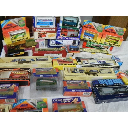 2332 - Approximately 30 boxed die cast models.