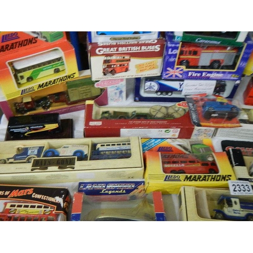 2332 - Approximately 30 boxed die cast models.