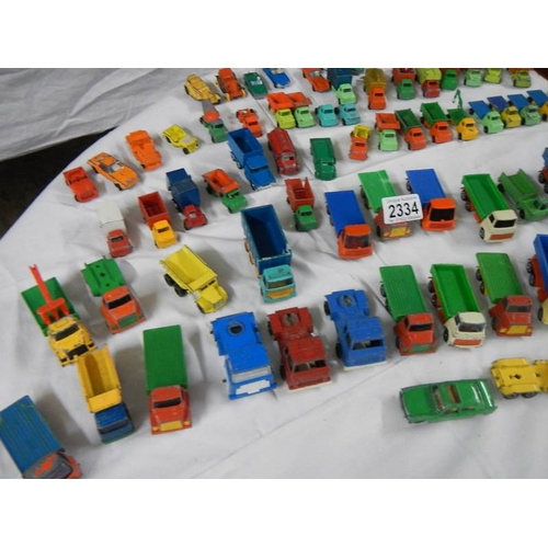 2334 - Approximately 60 die cast trucks etc.,