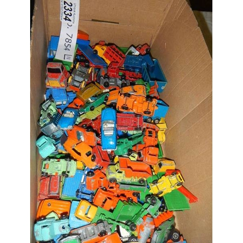 2334 - Approximately 60 die cast trucks etc.,