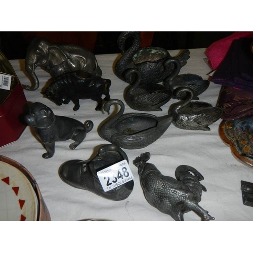 2348 - A good mixed lot of interesting items including old pewter (some a/f), textiles etc.,