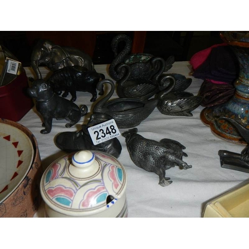 2348 - A good mixed lot of interesting items including old pewter (some a/f), textiles etc.,