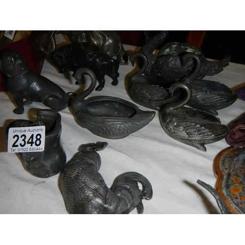 2348 - A good mixed lot of interesting items including old pewter (some a/f), textiles etc.,