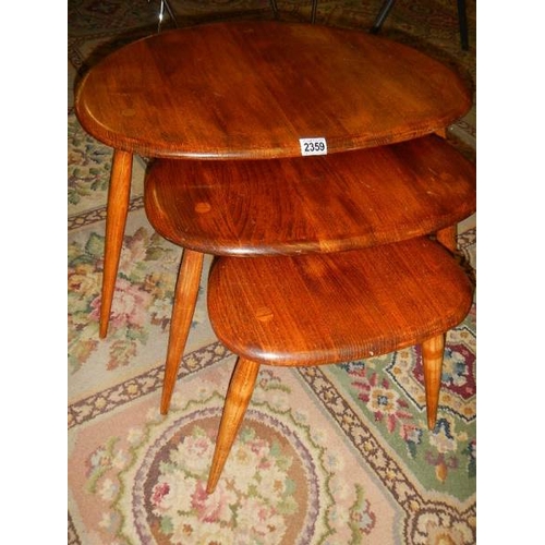 2359 - A nest of 3 ercol tables.