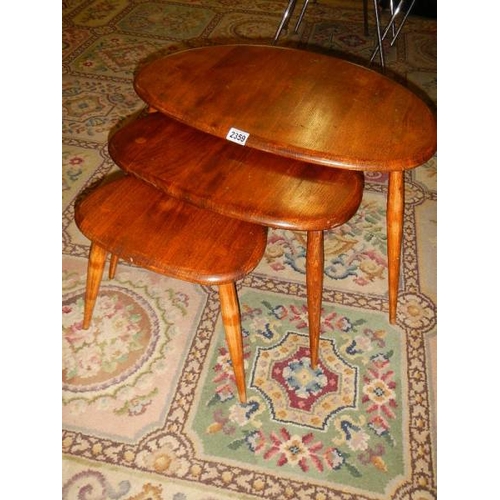 2359 - A nest of 3 ercol tables.