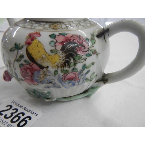 2366 - An 18th century Chinese teapot, missing lid and a/f.