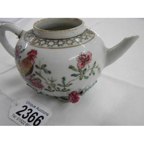 2366 - An 18th century Chinese teapot, missing lid and a/f.