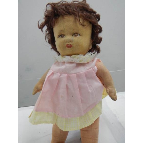 2371 - A vintage cloth doll.