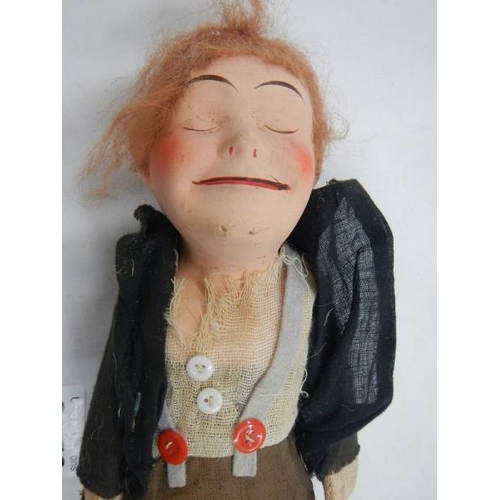 2372 - A vintage tramp cloth doll.