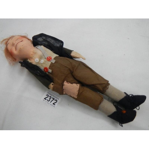 2372 - A vintage tramp cloth doll.