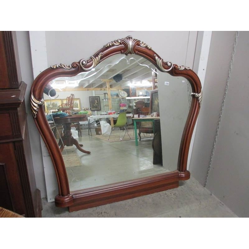 2384 - A large mahogany overmantel mirror.