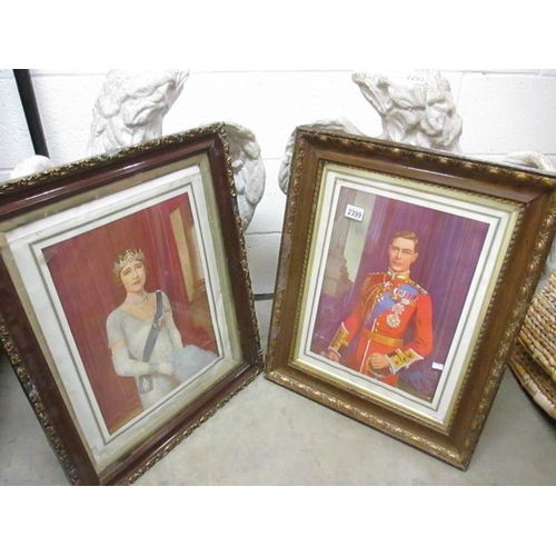 2399 - A pair of framed and glazed portrait prints of King George VI and Queen Elizabeth the Queen Mother.