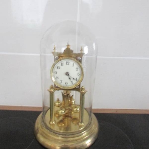 2006 - A good quality anniversary clock under glass dome.