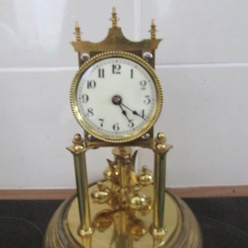 2006 - A good quality anniversary clock under glass dome.