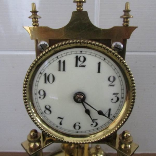 2006 - A good quality anniversary clock under glass dome.