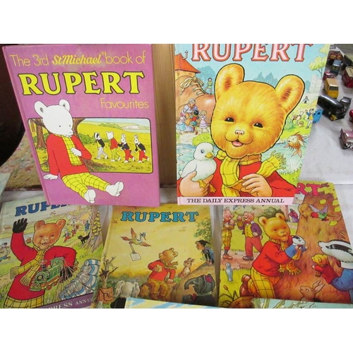 2038 - 9 Rupert annuals.