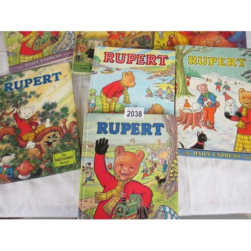 2038 - 9 Rupert annuals.