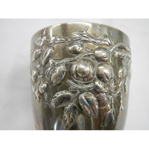 2028 - A good hall marked silver embossed chalice, 240 grams.