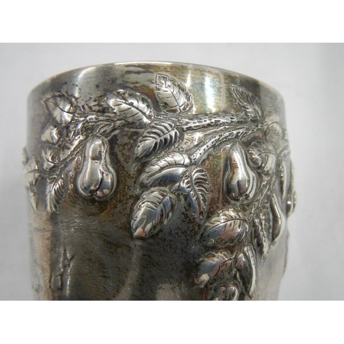 2028 - A good hall marked silver embossed chalice, 240 grams.