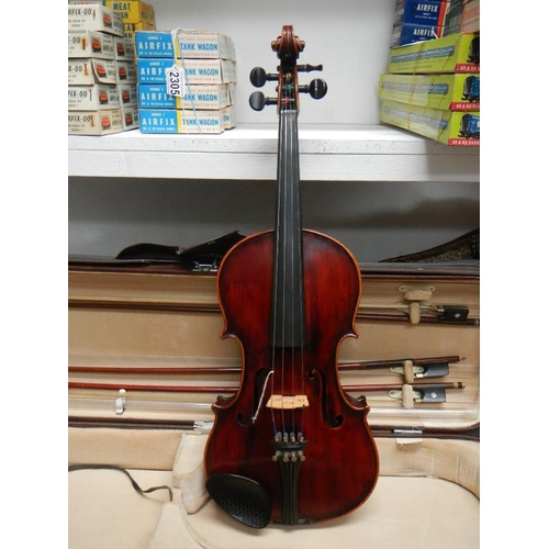 2365 - A cased late 19th century violin - Carlo Fissorie, Milano, Anno 1896? with 3 bows.