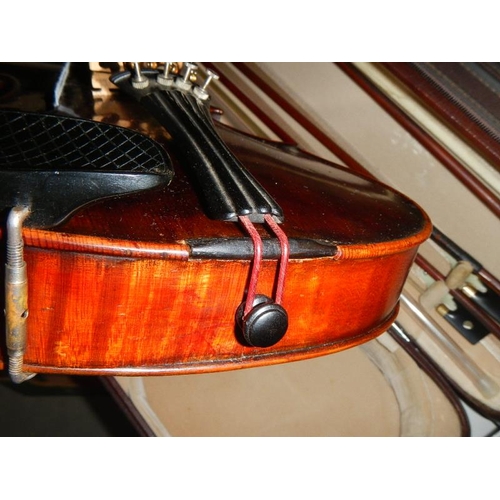 2365 - A cased late 19th century violin - Carlo Fissorie, Milano, Anno 1896? with 3 bows.