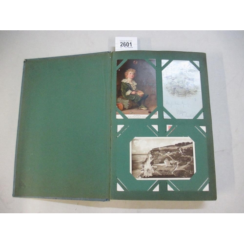 2601 - A good postcard album including military, topographical, comic etc (approx 240 postcards, a selectio... 