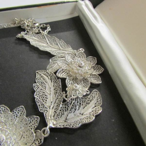 2461 - A vintage silver filigree necklace fashioned with flowers and leaves, attached pendant drop, ideal f... 