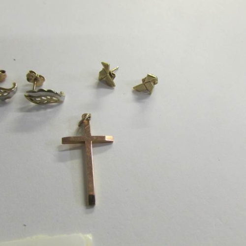 2462 - 3 pairs of 9ct gold earrings in fancy stud designs, amethyst pendant and a cross.