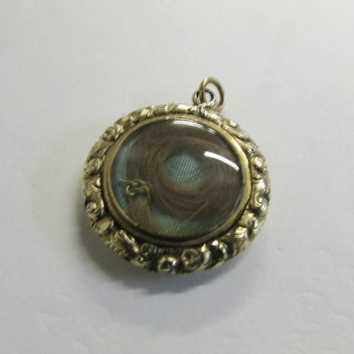 2464 - A Georgian memorial locket dated January 1830 and inscribed Joseph Elkins together with a further 19... 