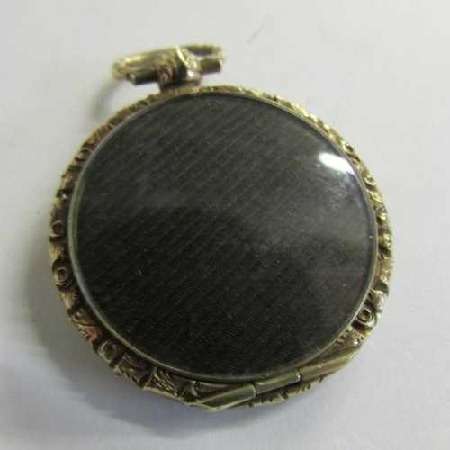 2464 - A Georgian memorial locket dated January 1830 and inscribed Joseph Elkins together with a further 19... 