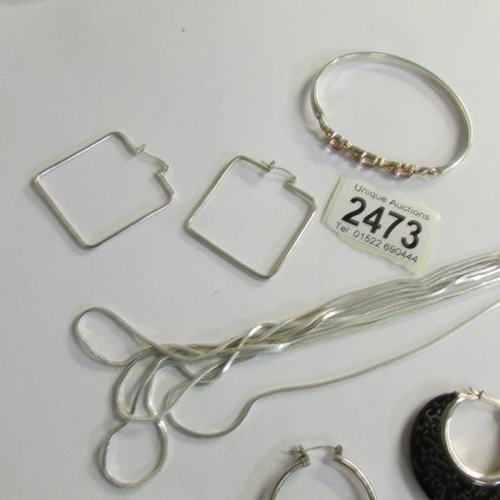 2473 - An Italian three row necklace silver Milor make together with three pairs of silver earrings and a s... 