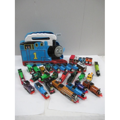 2630 - Box containing various ERTL Thomas Tank series vehicles including a carry case