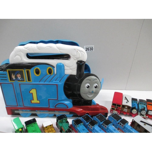 2630 - Box containing various ERTL Thomas Tank series vehicles including a carry case