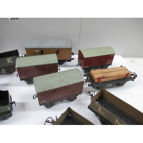 2640 - Box containing various tin plate railway carriages and rolling stock