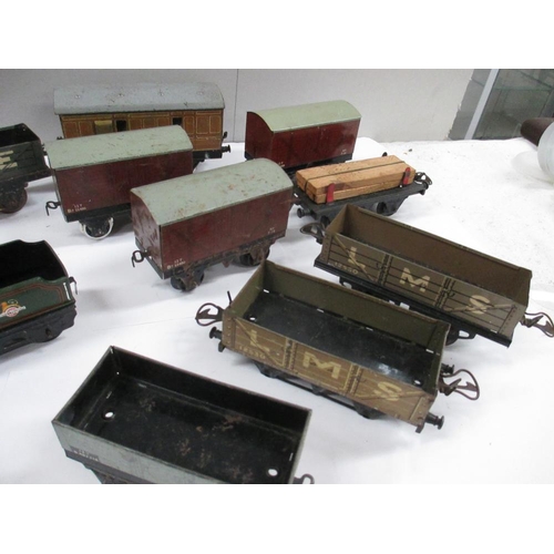 2640 - Box containing various tin plate railway carriages and rolling stock