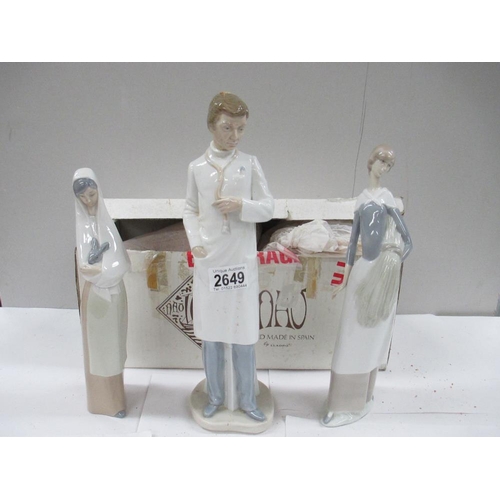 2649 - 3 NAO figures including Doctor (with box), Lady with head scarf, and Lady with Rabbit