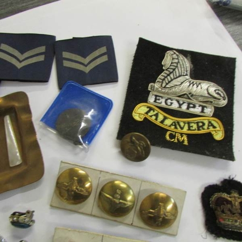 2482 - A mixed lot of military badges, buttons etc.,