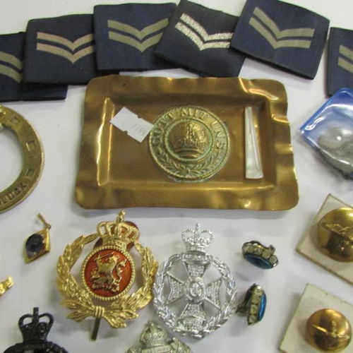 2482 - A mixed lot of military badges, buttons etc.,