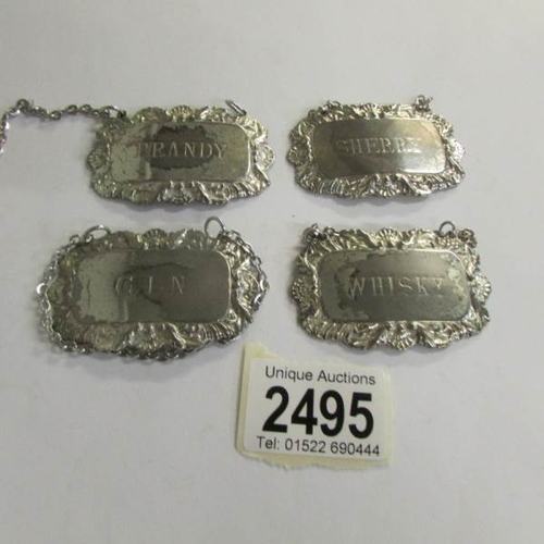 2495 - 4 silver plate spirit labels.