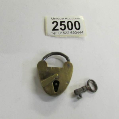 2500 - An old brass padlock with key.