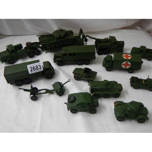 2683 - 14 Dinky military vehicles including tank transporter, field gun set, ambulance etc.,