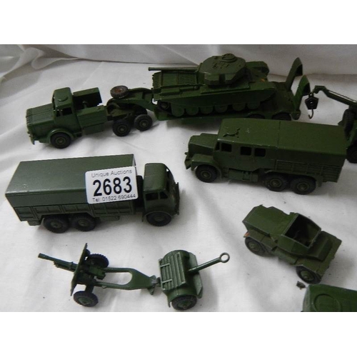 2683 - 14 Dinky military vehicles including tank transporter, field gun set, ambulance etc.,