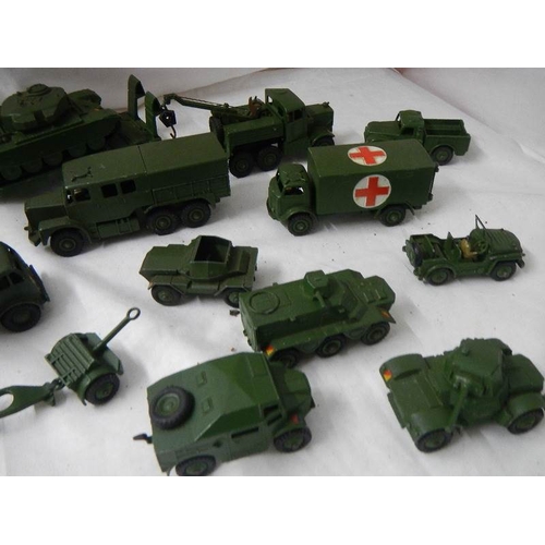 2683 - 14 Dinky military vehicles including tank transporter, field gun set, ambulance etc.,