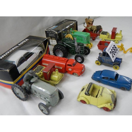 2688 - A quantity of boxed and unboxed diecast including Morestone Noddy car and train.