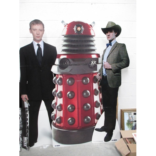 2611 - A collection of three tall standee Dr Who characters including Dalek (181cm high approx), Matt Smith... 