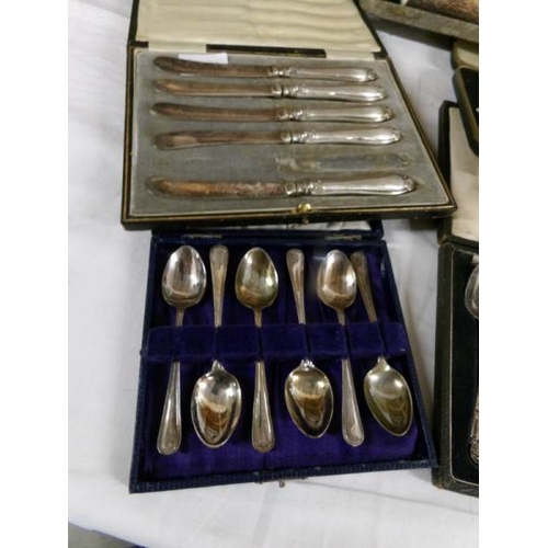 2544 - A mixed lot of cased cutlery including fish servers, carving set, spoons, knives etc.,