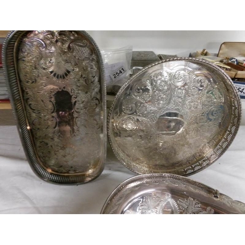 2545 - A mixed lot of silver plate including trays, basket, spills etc.,