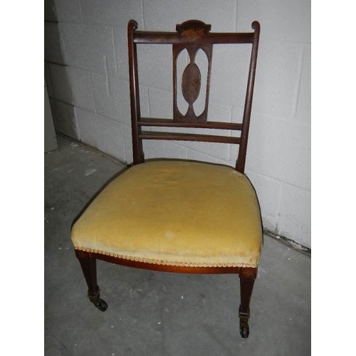 2752 - A mahogany inlaid bedroom chair in good condition.