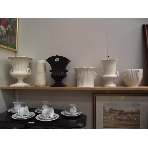 195 - A quantity of planters/vases/urns including Sylvac, Wedgwood etc.