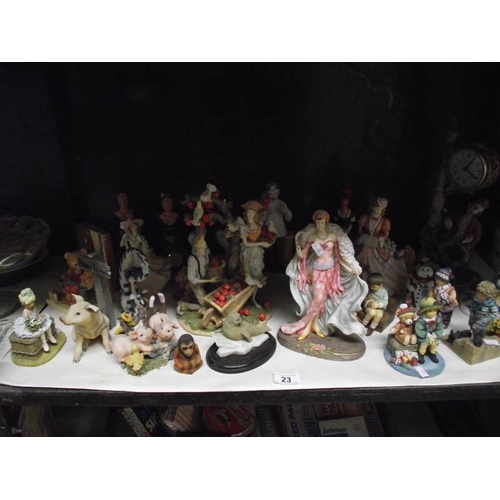 23 - A large quantity of ornaments, figures, animals etc.,